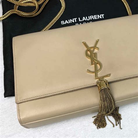 ysl gold tassel bag|YSL kate 99 bag.